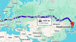 Map showing a highlighted road route from Calais, France, across Europe and Russia to Vladivostok, labelled 11,815 kilometres and 145 hours’ driving time.